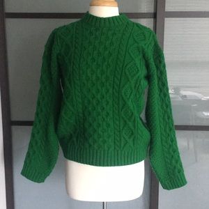 Green cable knit sweater